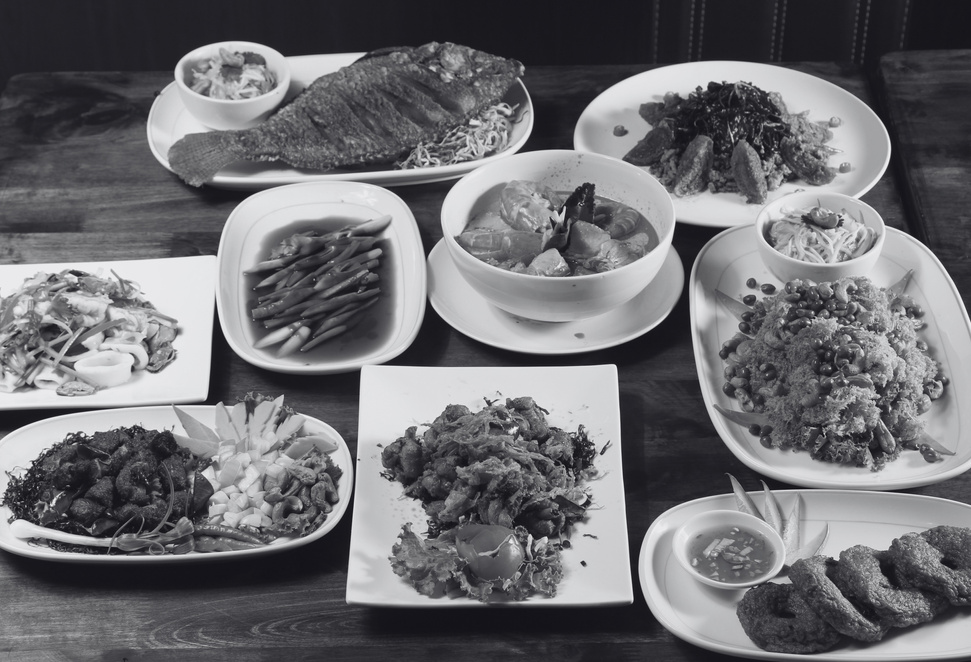 a black and white photo of food on a table
