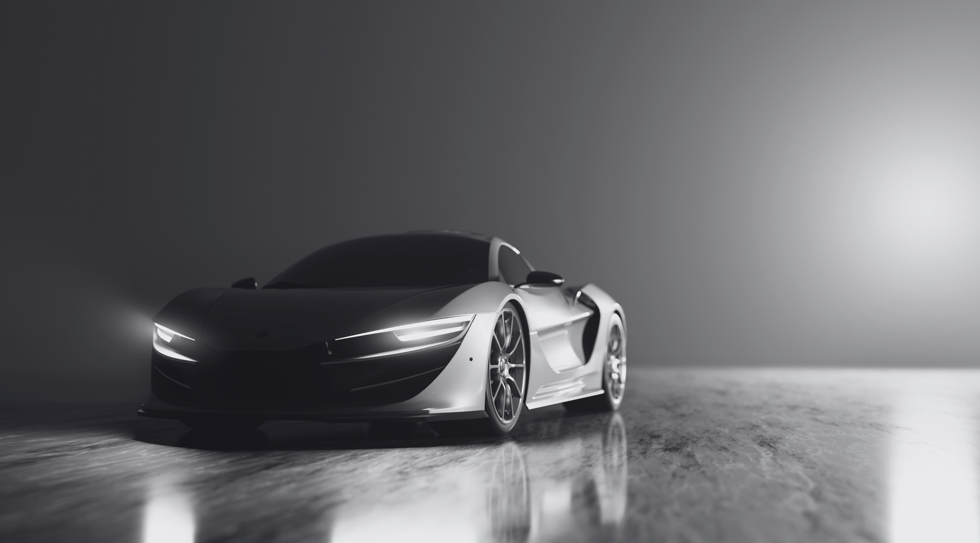 a black and white image of a sports car